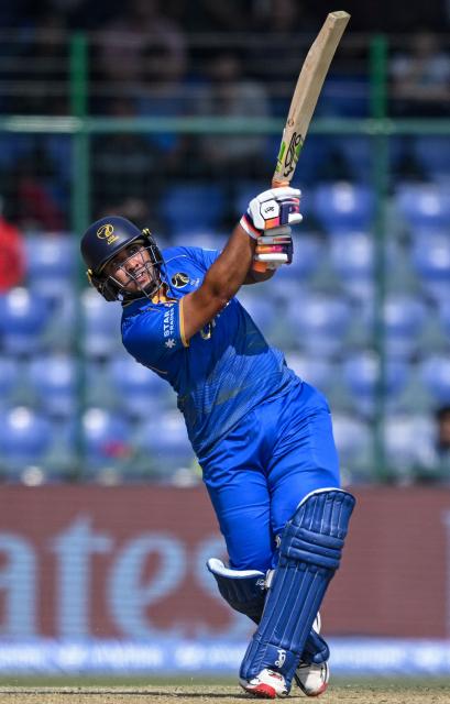 UAE's Alishan Sharafu plays a shot during the 2026 ICC Men's T20 Cricket World Cup group stage match between Afghanistan and United Arab Emirates at the Arun Jaitley Stadium in New Delhi on February 16, 2026. (Photo by Arun SANKAR / AFP)