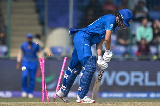 Afghanistan's Sediqullah Atal is clean bowled by UAE's Muhammad Jawadullah during the 2026 ICC Men's T20 Cricket World Cup group stage match between Afghanistan and United Arab Emirates at the Arun Jaitley Stadium in New Delhi on February 16, 2026. (Photo by Arun SANKAR / AFP)