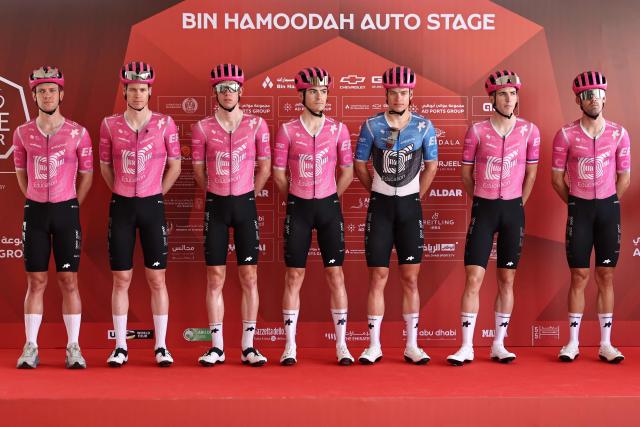 Team EF Education-Easypost's riders pose on the stage ahead of the first stage of the UAE Tour cycling event from Madinat Zayed Majlis to Liwa Palace in Abu Dhabi on February 16, 2026. (Photo by Fadel SENNA / AFP)