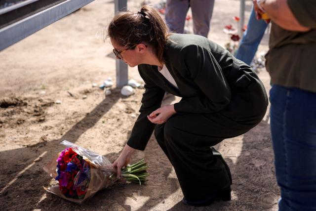TOPSHOT - Aurore Berge, France's junior Minister in charge of equality, lays a wreath of flowers during her visit to the memorial to the victims of the 2023 October 7 attacks at the Nova Festival grounds in Reim in southern Israel on February 16, 2026. (Photo by Ilia YEFIMOVICH / AFP)