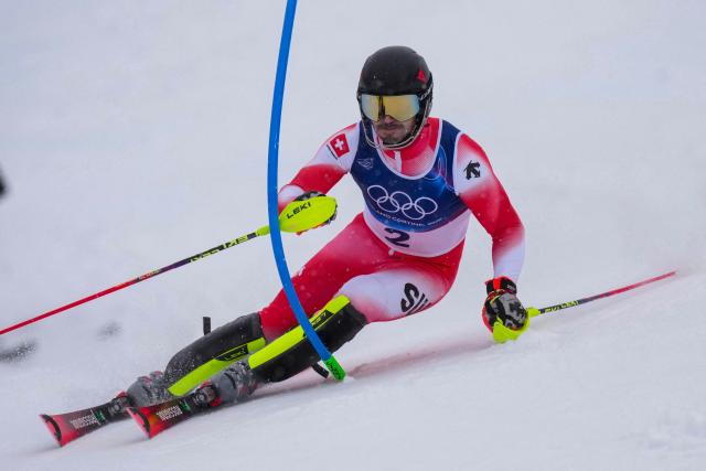 Switzerland's Loic Meillard competes in the first run of the men's slalom alpine skiing event during the Milano Cortina 2026 Winter Olympic Games at the Stelvio Ski Centre in Bormio (Valtellina) on February 16, 2026. (Photo by Dimitar DILKOFF / AFP)