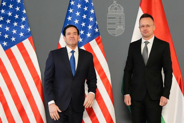US Secretary of State Marco Rubio (L) and Hungary's Foreign Minister Peter Szijjarto meet in Budapest, Hungary, on February 16, 2026. (Photo by Alex Brandon / POOL / AFP)