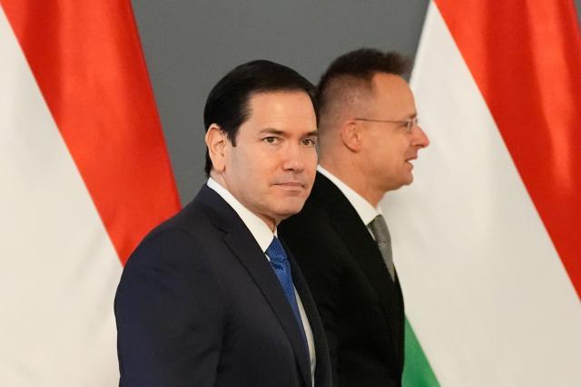 US Secretary of State Marco Rubio (L) and Hungary's Foreign Minister Peter Szijjarto meet in Budapest, Hungary, on February 16, 2026. (Photo by Alex Brandon / POOL / AFP)