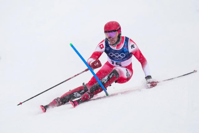 Switzerland's Tanguy Nef competes in the first run of the men's slalom alpine skiing event during the Milano Cortina 2026 Winter Olympic Games at the Stelvio Ski Centre in Bormio (Valtellina) on February 16, 2026. (Photo by Dimitar DILKOFF / AFP)