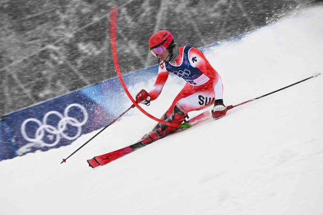 Switzerland's Tanguy Nef competes in the first run of the men's slalom alpine skiing event during the Milano Cortina 2026 Winter Olympic Games at the Stelvio Ski Centre in Bormio (Valtellina) on February 16, 2026. (Photo by Fabrice COFFRINI / AFP)