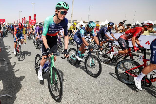 Decathlon CMA CGM Team's Dutch rider Daan Hoole (L front) cycles during the first stage of the UAE Tour cycling event from Madinat Zayed Majlis to Liwa Palace in Abu Dhabi on February 16, 2026. (Photo by Fadel SENNA / AFP)