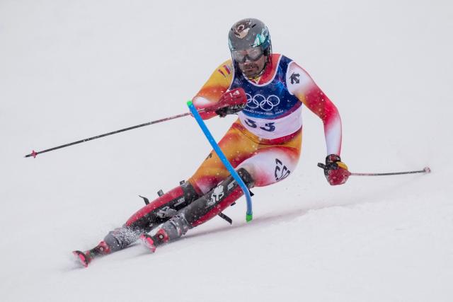 Spain's Joaquim Salarich Baucells competes in the first run of the men's slalom alpine skiing event during the Milano Cortina 2026 Winter Olympic Games at the Stelvio Ski Centre in Bormio (Valtellina) on February 16, 2026. (Photo by Dimitar DILKOFF / AFP)