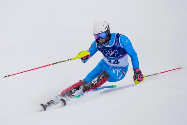 Italy's Tobias Kastlunger competes in the first run of the men's slalom alpine skiing event during the Milano Cortina 2026 Winter Olympic Games at the Stelvio Ski Centre in Bormio (Valtellina) on February 16, 2026. (Photo by Dimitar DILKOFF / AFP)