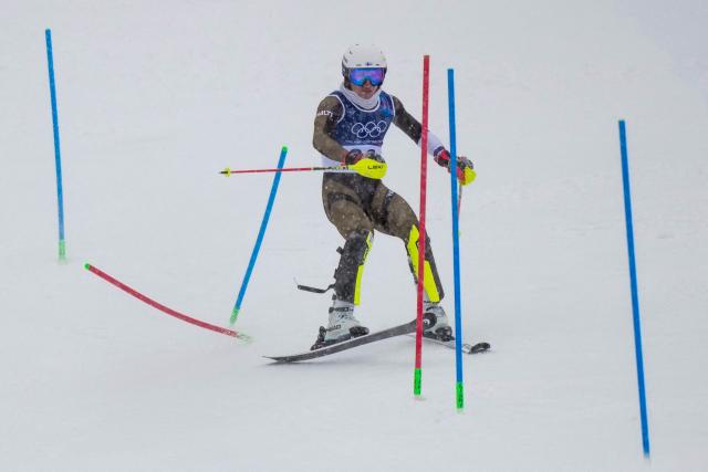 Finland's Jesper Pohjolainen skis out in the first run of the men's slalom alpine skiing event during the Milano Cortina 2026 Winter Olympic Games at the Stelvio Ski Centre in Bormio (Valtellina) on February 16, 2026. (Photo by Dimitar DILKOFF / AFP)