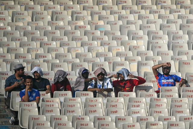 Spectators watch the 2026 ICC Men's T20 Cricket World Cup group stage match between England and Italy at the Eden Gardens in Kolkata on February 16, 2026. (Photo by Dibyangshu SARKAR / AFP)