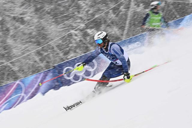 Individual Neutral Athlete Simon Efimov competes in the first run of the men's slalom alpine skiing event during the Milano Cortina 2026 Winter Olympic Games at the Stelvio Ski Centre in Bormio (Valtellina) on February 16, 2026. (Photo by Fabrice COFFRINI / AFP)