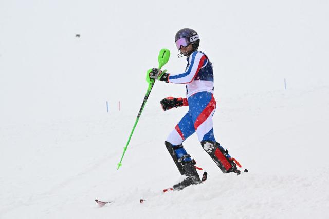 France's Leo Anguenot reacts after skiing out in the first run of the men's slalom alpine skiing event during the Milano Cortina 2026 Winter Olympic Games at the Stelvio Ski Centre in Bormio (Valtellina) on February 16, 2026. (Photo by Fabrice COFFRINI / AFP)