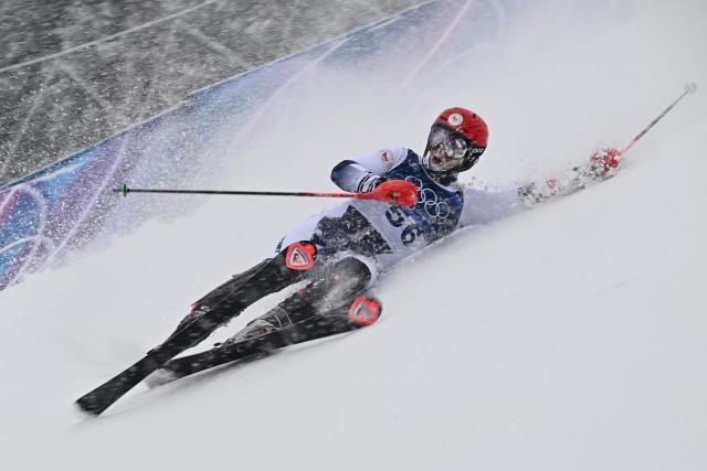 Czech Republic's Marek Muller crashes in the first run of the men's slalom alpine skiing event during the Milano Cortina 2026 Winter Olympic Games at the Stelvio Ski Centre in Bormio (Valtellina) on February 16, 2026. (Photo by Fabrice COFFRINI / AFP)