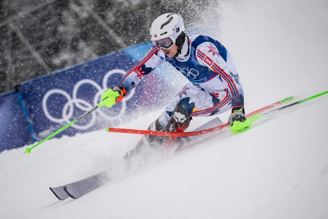 Norway's Henrik Kristoffersen competes in  the first run of the men's slalom alpine skiing event during the Milano Cortina 2026 Winter Olympic Games at the Stelvio Ski Centre in Bormio (Valtellina) on February 16, 2026. (Photo by Fabrice COFFRINI / AFP)