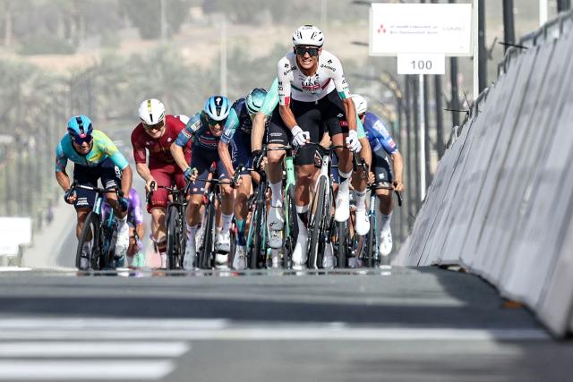 UAE Team Emirates's Mexican rider Isaac Del Toro Romero leads the pack while approaching the finish line during the first stage of the UAE Tour cycling event from Madinat Zayed Majlis to Liwa Palace in Abu Dhabi on February 16, 2026. (Photo by Fadel SENNA / AFP)
