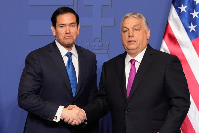 Hungary's Prime Minister Viktor Orban shakes hands with US Secretary of State Marco Rubio (L) after a joint press conference following talks during a visit in Budapest, Hungary, on February 16, 2026. (Photo by Alex Brandon / Pool AP / AFP)