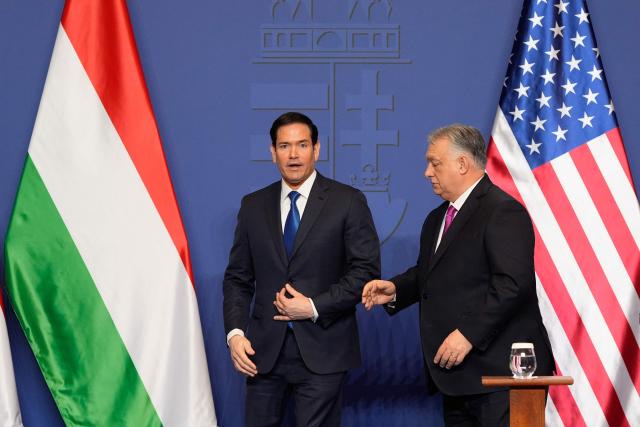 Hungary's Prime Minister Viktor Orban shakes hands with US Secretary of State Marco Rubio (L) after a joint press conference following talks during a visit in Budapest, Hungary, on February 16, 2026. (Photo by Alex Brandon / Pool AP / AFP)