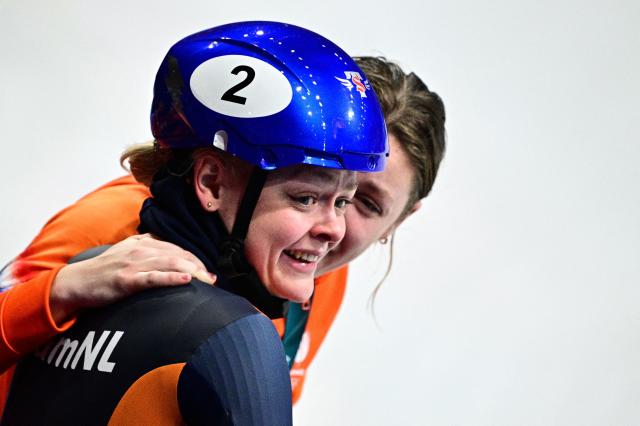 Netherlands' Xandra Velzeboer reacts after winning gold in the short track speed skating women's 1000m final during the Milano Cortina 2026 Winter Olympic Games at Milano Ice Skating Arena in Milan on February 16, 2026. (Photo by JULIEN DE ROSA / AFP)