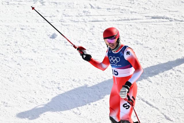 Switzerland's Tanguy Nef reacts in the finish area after competing in the second run of the men's slalom alpine skiing event during the Milano Cortina 2026 Winter Olympic Games at the Stelvio Ski Centre in Bormio (Valtellina) on February 16, 2026. (Photo by Fabrice COFFRINI / AFP)