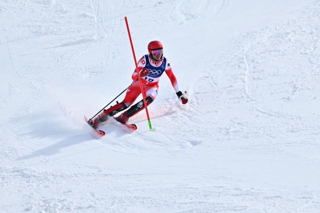 Switzerland's Tanguy Nef competes in the second run of the men's slalom alpine skiing event during the Milano Cortina 2026 Winter Olympic Games at the Stelvio Ski Centre in Bormio (Valtellina) on February 16, 2026. (Photo by Fabrice COFFRINI / AFP)