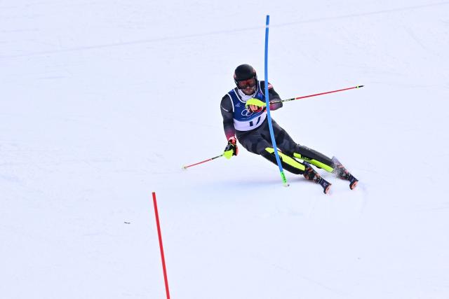 Austria's Michael Matt competes in the second run of the men's slalom alpine skiing event during the Milano Cortina 2026 Winter Olympic Games at the Stelvio Ski Centre in Bormio (Valtellina) on February 16, 2026. (Photo by Fabrice COFFRINI / AFP)