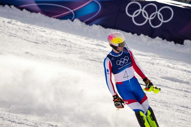 France's Clement Noel reacts after crossing the finish line in the second run of the men's slalom alpine skiing event during the Milano Cortina 2026 Winter Olympic Games at the Stelvio Ski Centre in Bormio (Valtellina) on February 16, 2026. (Photo by Dimitar DILKOFF / AFP)