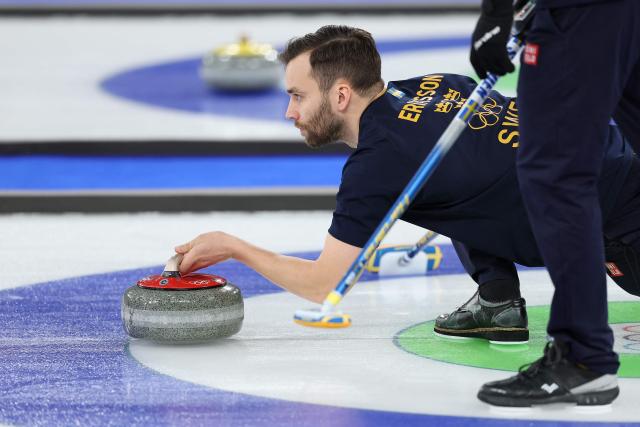 Sweden's Oskar Eriksson delivers the stone during the curling men's round robin between Sweden and Germany during the Milano Cortina 2026 Winter Olympic Games at the Cortina Curling Olympic Stadium in Cortina d’Ampezzo on February 16, 2026. (Photo by Odd ANDERSEN / AFP)