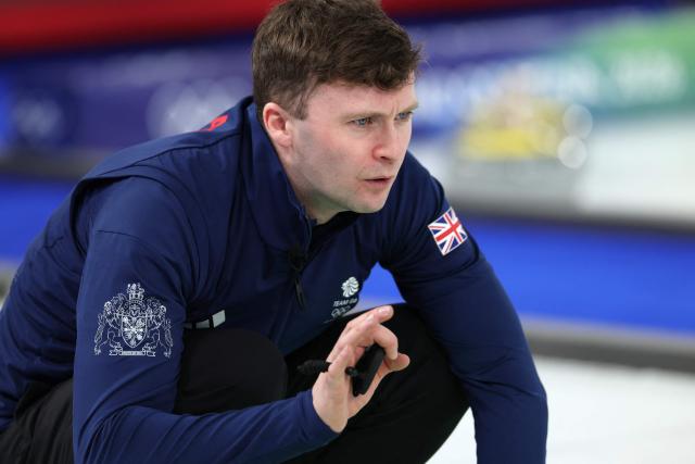 Britain's Bruce Mouat gestures during the curling men's round robin between Britain and Norway during the Milano Cortina 2026 Winter Olympic Games at the Cortina Curling Olympic Stadium in Cortina d’Ampezzo on February 16, 2026. (Photo by Odd ANDERSEN / AFP)