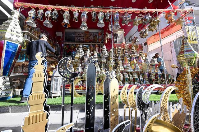 Decorations are displayed at a shop at a market in Kuwait City on February 16, 2026, as Muslims prepare for the holy month of Ramadan. For Muslims across the world, the beginning of the ninth month in the Muslim lunar calendar which marks the start of Ramadan, is a time for spiritual reflection, prayers, fasting and family reunions around the table after breaking the fast. (Photo by YASSER AL-ZAYYAT / AFP)