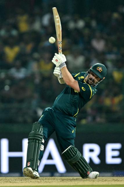 Australia's Travis Head plays a shot during the 2026 ICC Men's T20 Cricket World Cup group stage match between Australia and Sri Lanka at Pallekele International Cricket Stadium in Kandy on February 16, 2026. (Photo by Ishara S. KODIKARA / AFP)
