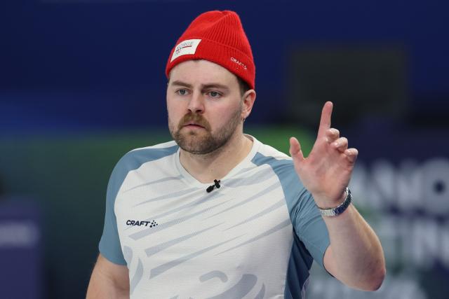 Norway's Martin Sesaker gestures during the curling men's round robin between Britain and Norway during the Milano Cortina 2026 Winter Olympic Games at the Cortina Curling Olympic Stadium in Cortina d’Ampezzo on February 16, 2026. (Photo by Odd ANDERSEN / AFP)