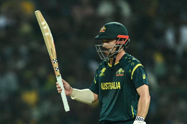 Australia's Travis Head celebrates after scoring a half-century (50 runs) during the 2026 ICC Men's T20 Cricket World Cup group stage match between Australia and Sri Lanka at Pallekele International Cricket Stadium in Kandy on February 16, 2026. (Photo by Ishara S. KODIKARA / AFP)