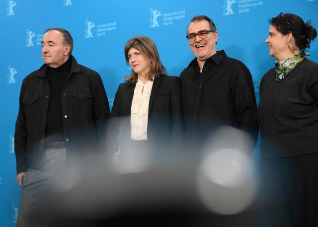 (From L) Ukrainian producer Alexander Rodnyansky, Hungarian screenwriter Kata Weber, Hungarian actor, theater and film director Kornel Mundruczo and Hungarian producer Viktoria Petranyi pose during a photo call for the film "At the Sea" presented in competition at the 76th Berlinale, Europe's first major film festival of the year, in Berlin on February 16, 2026. (Photo by RALF HIRSCHBERGER / AFP)