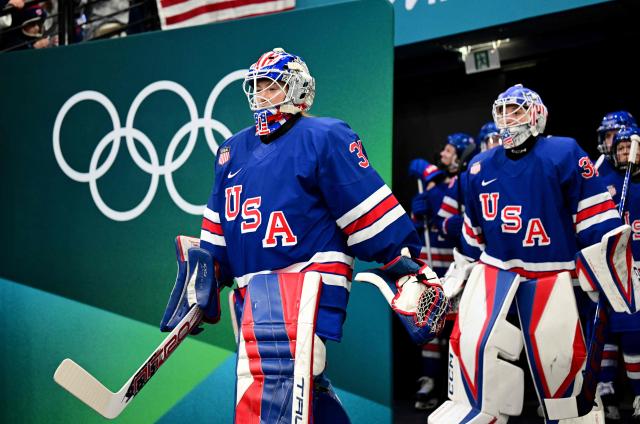 USA's goalkeeper #31 Aerin Frankel enters the ice rink at the start of the women's play-off semi-final ice hockey match between USA and Sweden at the Milano Santagiulia Ice Hockey Arena during the Milano Cortina 2026 Winter Olympic Games in Milan, on February 16, 2026. (Photo by Piero CRUCIATTI / AFP)