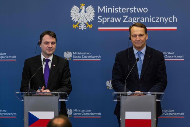 Czech Republic's Foreign Minister Petr Macinka (L) and Poland's Deputy Prime Minister and Foreign Affairs Minister Radoslaw Sikorski address a join press conference after their meeting at the ministry building in Warsaw on February 16, 2026. (Photo by Wojtek RADWANSKI / AFP)