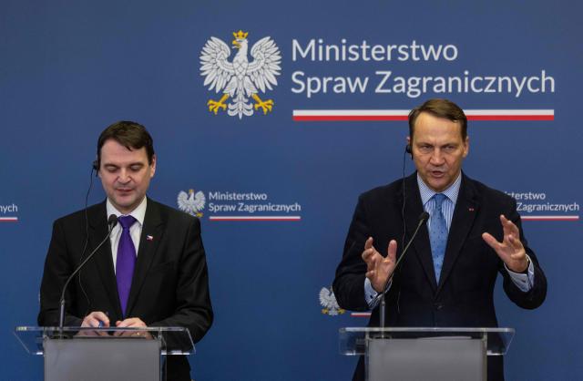 Czech Republic's Foreign Minister Petr Macinka (L) and Poland's Deputy Prime Minister and Foreign Affairs Minister Radoslaw Sikorski address a join press conference after their meeting at the ministry building in Warsaw on February 16, 2026. (Photo by Wojtek RADWANSKI / AFP)