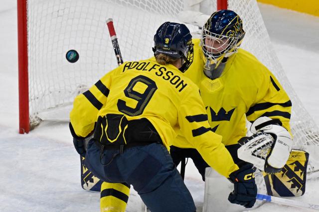 Sweden's #01 Ebba Svensson Traff reacts after missing to stop USA's third goal shot by USA's forward #37 Abbey Murphy during the women's play-off semi-final ice hockey match between USA and Sweden at the Milano Santagiulia Ice Hockey Arena during the Milano Cortina 2026 Winter Olympic Games in Milan, on February 16, 2026. (Photo by Alexander NEMENOV / AFP)