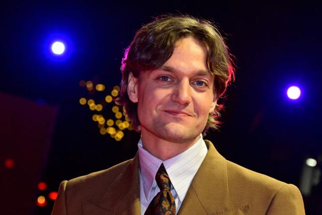European Shooting Star Austrian actor Lucas Englander poses on the red carpet for the film "At the Sea" presented in competition at the 76th Berlinale, Europe's first major film festival of the year, in Berlin on February 16, 2026. (Photo by John MACDOUGALL / AFP)