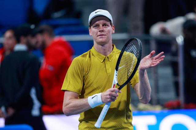 Italy's Jannik Sinner reacts after winning his men’s singles match against Czech Republic's Tomas Machac at the Qatar Open tennis tournament in Doha on February 16, 2026. (Photo by Karim JAAFAR / AFP)