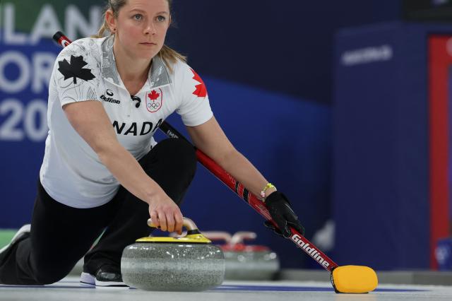 Canada's Sarah Wilkes competes in the curling women's round robin between Japan and Canada during the Milano Cortina 2026 Winter Olympic Games at the Cortina Curling Olympic Stadium in Cortina d’Ampezzo on February 16, 2026. (Photo by Odd ANDERSEN / AFP)
