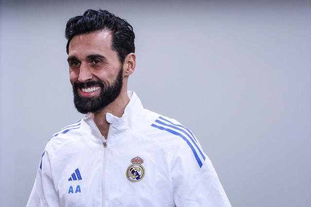 Real Madrid's Spanish coach Alvaro Arbeloa arrives for a press conference on the eve of their UEFA Champions League knockout round play-off first leg football match against Benfica at Estadio da Luz in Lisbon, on February 16, 2026. (Photo by PATRICIA DE MELO MOREIRA / AFP)