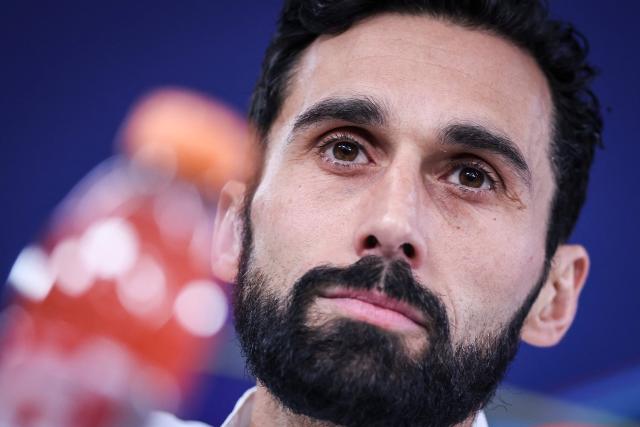 Real Madrid's Spanish coach Alvaro Arbeloa looks on during a press conference on the eve of their UEFA Champions League knockout round play-off first leg football match against Benfica at Estadio da Luz in Lisbon, on February 16, 2026. (Photo by PATRICIA DE MELO MOREIRA / AFP)