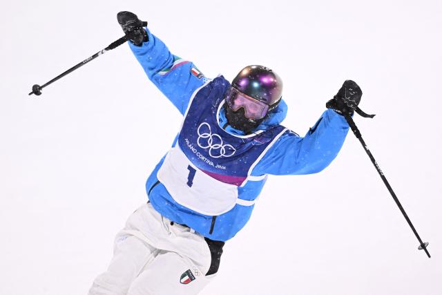 Italy's Flora Tabanelli reacts in the freestyle skiing women's freeski big air final run 1 during the Milano Cortina 2026 Winter Olympic Games at Livigno Snow Park, in Livigno (Valtellina), on February 16, 2026. (Photo by Kirill KUDRYAVTSEV / AFP)