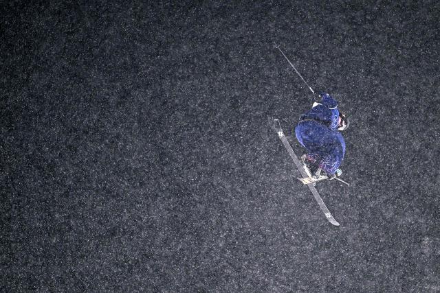 Britain's Kirsty Muir competes in the freestyle skiing women's freeski big air final run 1 during the Milano Cortina 2026 Winter Olympic Games at Livigno Snow Park, in Livigno (Valtellina), on February 16, 2026. (Photo by Kirill KUDRYAVTSEV / AFP)