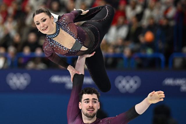 Germany's Annika Hocke and Germany's Robert Kunkel compete in the figure skating pair skating free skating final during the Milano Cortina 2026 Winter Olympic Games at Milano Ice Skating Arena in Milan on February 16, 2026. (Photo by Gabriel BOUYS / AFP)