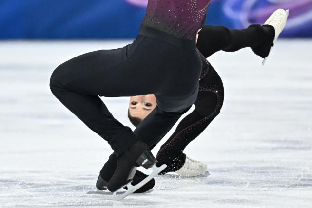 Germany's Annika Hocke and Germany's Robert Kunkel compete in the figure skating pair skating free skating final during the Milano Cortina 2026 Winter Olympic Games at Milano Ice Skating Arena in Milan on February 16, 2026. (Photo by Gabriel BOUYS / AFP)