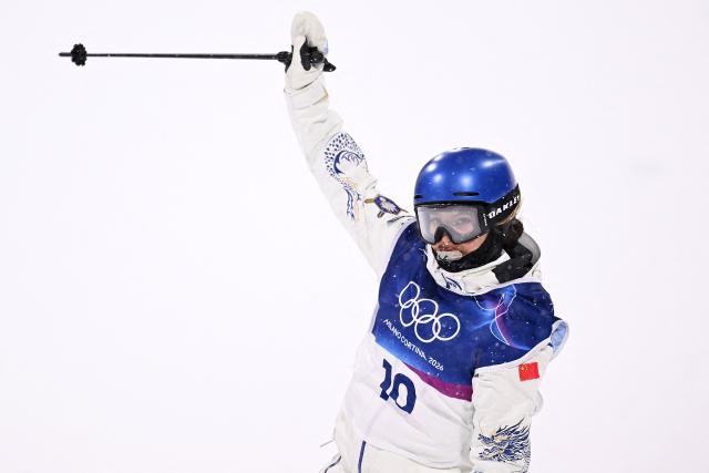 China's Gu Ailing Eileen reacts in the freestyle skiing women's freeski big air final run 1 during the Milano Cortina 2026 Winter Olympic Games at Livigno Snow Park, in Livigno (Valtellina), on February 16, 2026. (Photo by Kirill KUDRYAVTSEV / AFP)
