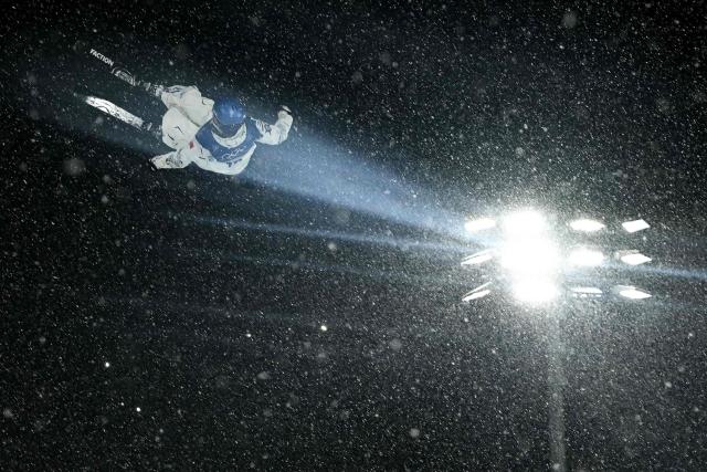 China's Gu Ailing Eileen competes in the freestyle skiing women's freeski big air final run 1 during the Milano Cortina 2026 Winter Olympic Games at Livigno Snow Park, in Livigno (Valtellina), on February 16, 2026. (Photo by Jeff PACHOUD / AFP)