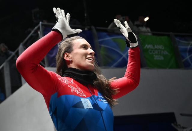 Slovakia's Viktoria Cernanska reacts after competing in the bobsleigh women's monobob heat 4 at Cortina Sliding Centre during the Milano Cortina 2026 Winter Olympic Games in Cortina d'Ampezzo on February 16, 2026. (Photo by Marco BERTORELLO / AFP)