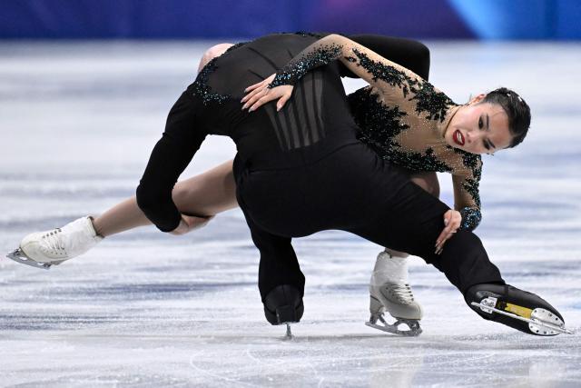 USA's Ellie Kam and USA's Danny O'Shea compete in the figure skating pair skating free skating final during the Milano Cortina 2026 Winter Olympic Games at Milano Ice Skating Arena in Milan on February 16, 2026. (Photo by WANG Zhao / AFP)
